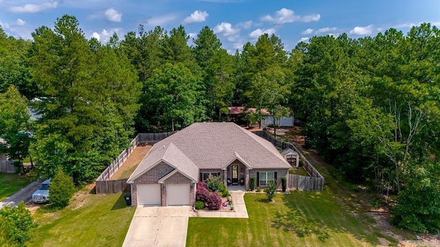 274 Reuben Dr, Alexander, AR 72202 - view of front facade with concrete driveway, a garage, and brick siding