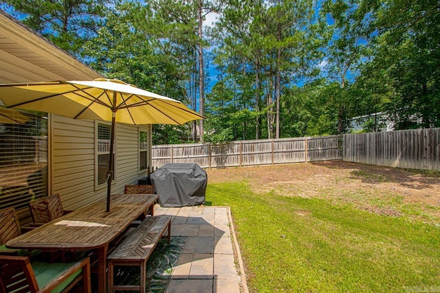 274 Reuben Dr, Alexander, AR 72202 - fenced backyard with a patio