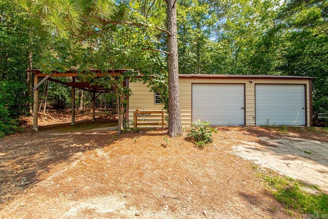 274 Reuben Dr, Alexander, AR 72202 - detached garage with dirt driveway