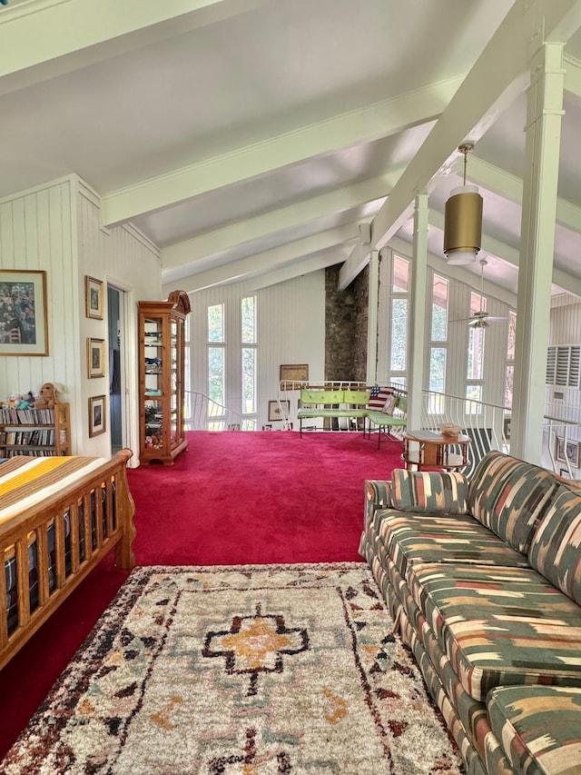 living area featuring carpet floors and ceiling fan