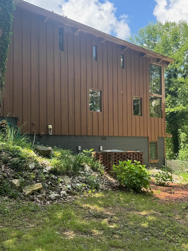 view of home's exterior with board and batten siding