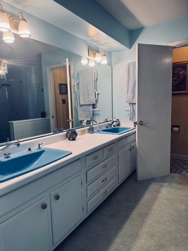 bathroom featuring double vanity