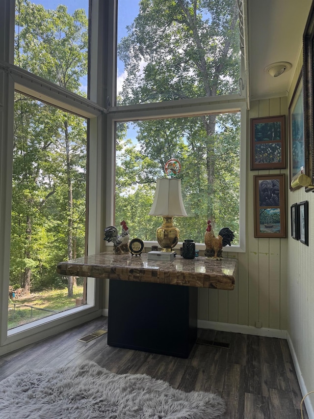 office featuring wood finished floors and healthy amount of natural light