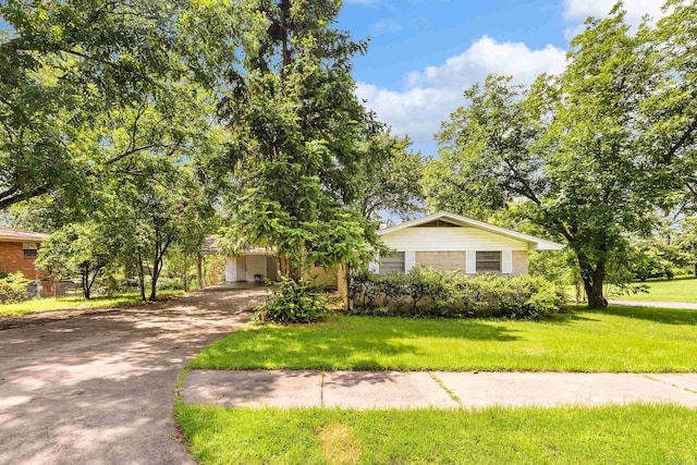 100 E Scenic Dr, North Little Rock, AR 72118 - view of front facade with asphalt driveway, a front yard, and brick siding