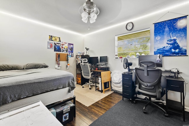 100 E Scenic Dr, North Little Rock, AR 72118 - bedroom featuring a desk, dark wood-type flooring, and a ceiling fan