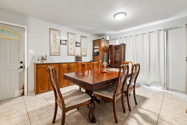 100 E Scenic Dr, North Little Rock, AR 72118 - dining area featuring light tile patterned flooring and ornamental molding