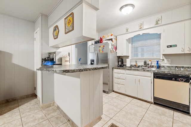 100 E Scenic Dr, North Little Rock, AR 72118 - kitchen with white dishwasher, stainless steel refrigerator with ice dispenser, dark countertops, crown molding, and light tile patterned floors