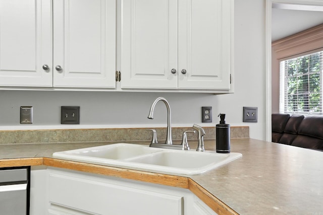 7328 W Ridge Cir, Sherwood, AR 72120 - kitchen featuring white cabinets and light countertops