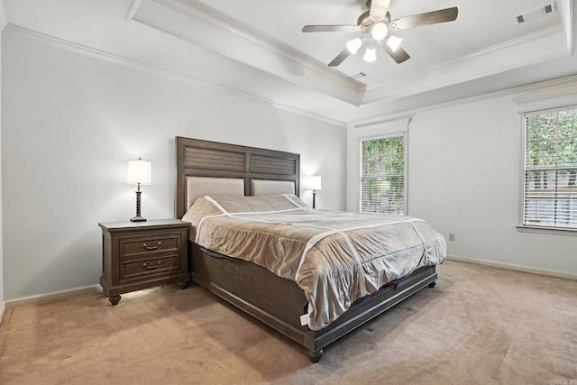 7328 W Ridge Cir, Sherwood, AR 72120 - bedroom featuring light carpet, ornamental molding, a tray ceiling, and a ceiling fan