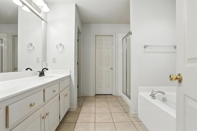 7328 W Ridge Cir, Sherwood, AR 72120 - full bathroom with vanity, a shower stall, tile patterned floors, and a bath