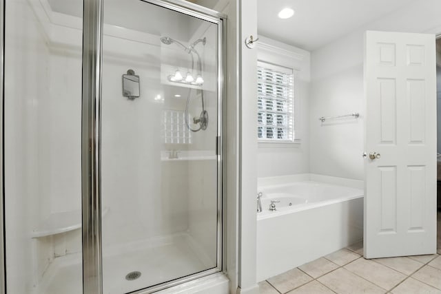 7328 W Ridge Cir, Sherwood, AR 72120 - bathroom with a garden tub, a stall shower, and tile patterned floors