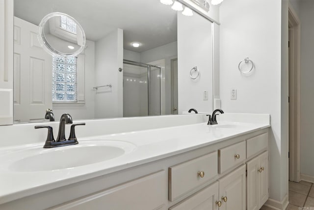 7328 W Ridge Cir, Sherwood, AR 72120 - full bathroom with a stall shower, double vanity, and tile patterned floors