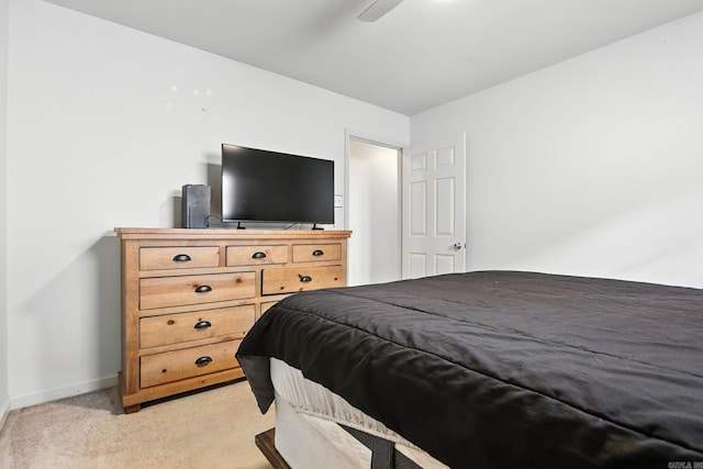 7328 W Ridge Cir, Sherwood, AR 72120 - bedroom with light colored carpet and a ceiling fan