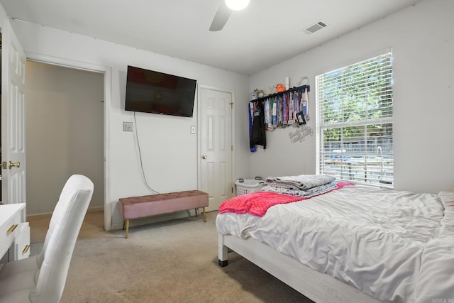 7328 W Ridge Cir, Sherwood, AR 72120 - bedroom with light colored carpet and ceiling fan