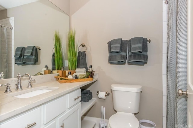 bathroom featuring vanity and a shower with shower curtain