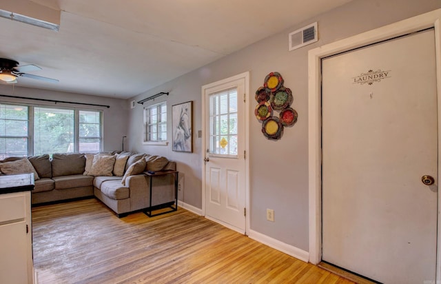 111 Greenland Cv, Little Rock, AR 72204 - living room with a ceiling fan and light wood-style flooring