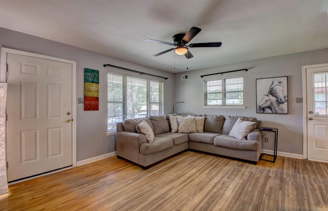 111 Greenland Cv, Little Rock, AR 72204 - living room featuring light wood-type flooring, healthy amount of natural light, and a ceiling fan