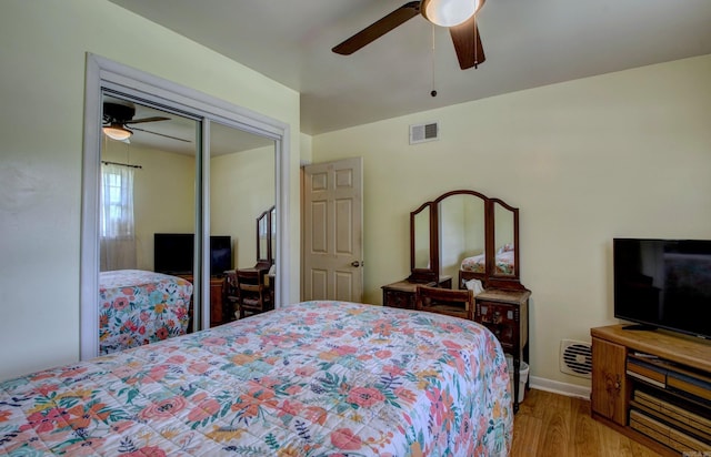 111 Greenland Cv, Little Rock, AR 72204 - bedroom with light wood-style flooring, a closet, and a ceiling fan