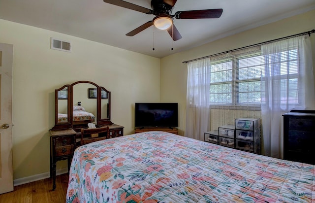 111 Greenland Cv, Little Rock, AR 72204 - bedroom featuring wood finished floors and a ceiling fan