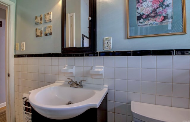 111 Greenland Cv, Little Rock, AR 72204 - half bath with tile walls and a wainscoted wall