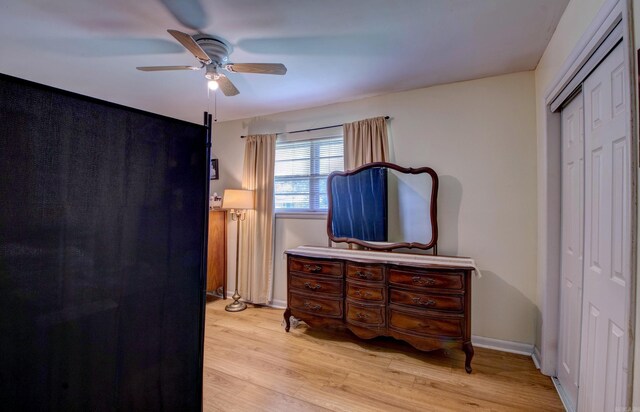 111 Greenland Cv, Little Rock, AR 72204 - bedroom with light wood finished floors, ceiling fan, and a closet