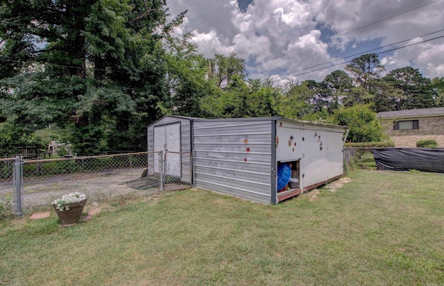 111 Greenland Cv, Little Rock, AR 72204 - view of shed featuring view of wooded area