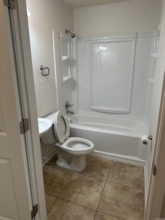 3505 Stockton Dr, Benton, AR 72015 - bathroom with bathtub / shower combination, a textured wall, and tile patterned floors