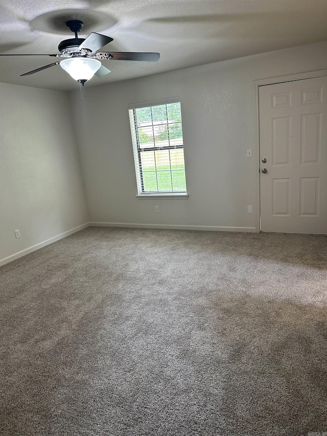 3505 Stockton Dr, Benton, AR 72015 - carpeted empty room featuring a ceiling fan and baseboards