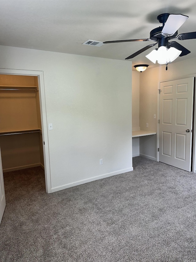 3505 Stockton Dr, Benton, AR 72015 - unfurnished bedroom featuring carpet, a walk in closet, a ceiling fan, and a closet