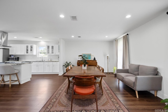 26 Buttermilk Rd, Little Rock, AR 72227 - dining space with dark wood finished floors and recessed lighting