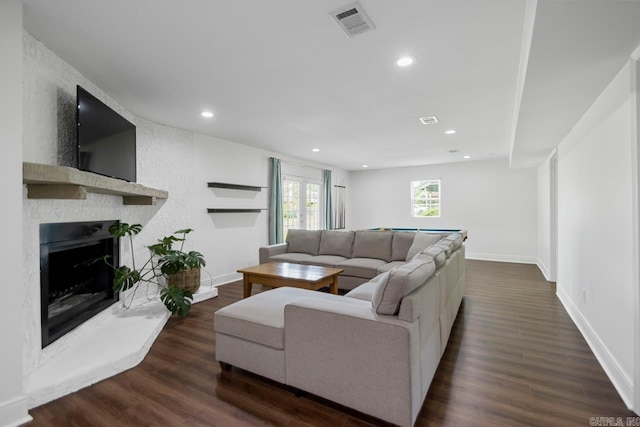 26 Buttermilk Rd, Little Rock, AR 72227 - living area featuring recessed lighting, a large fireplace, and dark wood-type flooring