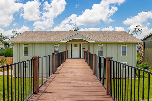 26 Buttermilk Rd, Little Rock, AR 72227 - view of front facade with a front lawn and a shingled roof