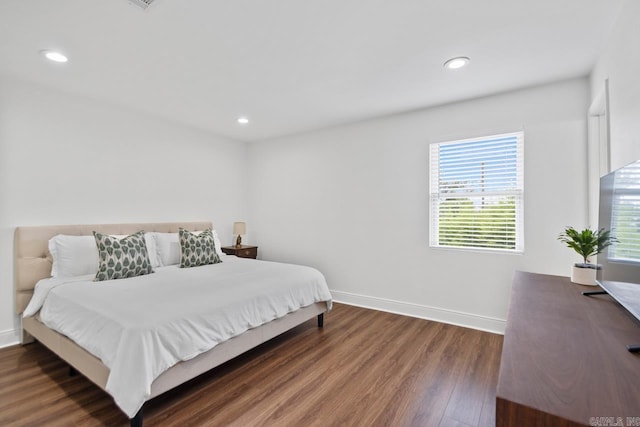 26 Buttermilk Rd, Little Rock, AR 72227 - bedroom with wood finished floors, multiple windows, and recessed lighting