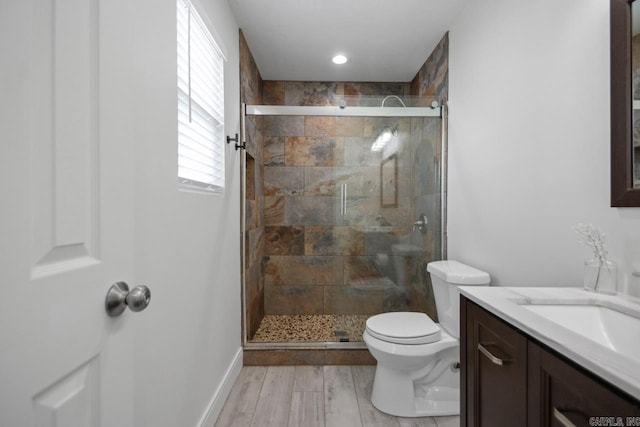 26 Buttermilk Rd, Little Rock, AR 72227 - bathroom featuring vanity, a stall shower, and wood finished floors