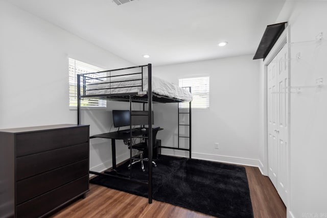 26 Buttermilk Rd, Little Rock, AR 72227 - bedroom with wood finished floors, an office area, recessed lighting, and a closet