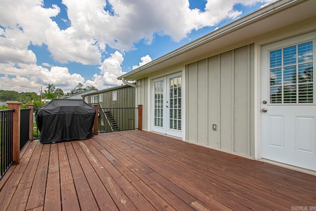 26 Buttermilk Rd, Little Rock, AR 72227 - wooden terrace with grilling area and french doors