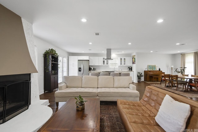 26 Buttermilk Rd, Little Rock, AR 72227 - living room featuring recessed lighting, dark wood-style floors, and a fireplace