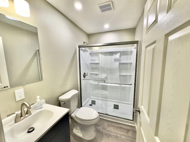 377 N 3rd St Unit B, Black Rock, AR 72415 - full bathroom with a shower stall, wood finished floors, and vanity