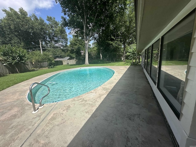 4 Jullian Cir, Dumas, AR 71639 - view of swimming pool featuring a patio and a fenced backyard