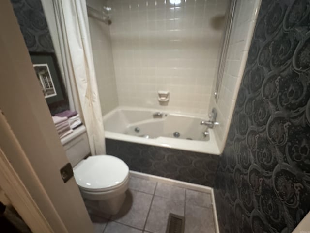 4 Jullian Cir, Dumas, AR 71639 - bathroom with shower / bath combo with shower curtain and tile patterned flooring