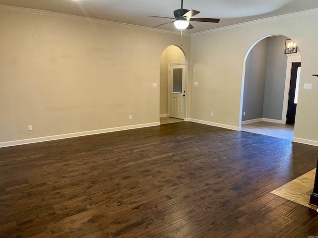 24 Tradewinds Dr, Cabot, AR 72023 - spare room with arched walkways, ceiling fan, dark wood-style flooring, and crown molding