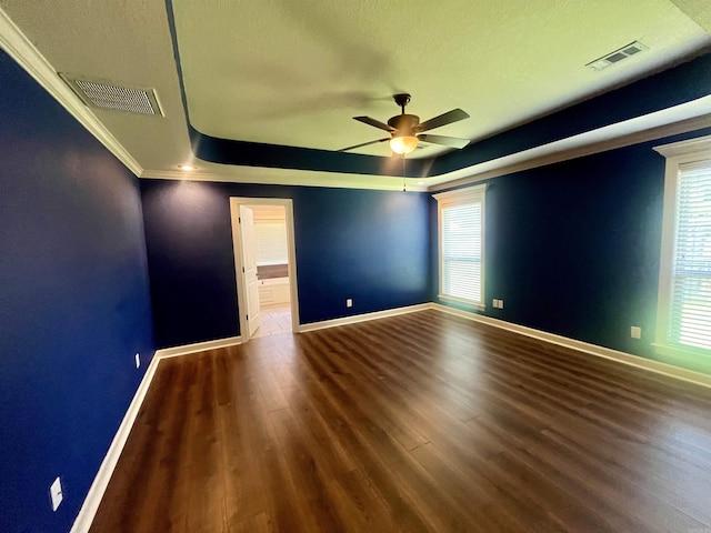 24 Tradewinds Dr, Cabot, AR 72023 - unfurnished room featuring a ceiling fan, a tray ceiling, wood finished floors, ornamental molding, and a textured ceiling