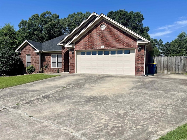 24 Tradewinds Dr, Cabot, AR 72023 - ranch-style home featuring brick siding, driveway, and an attached garage