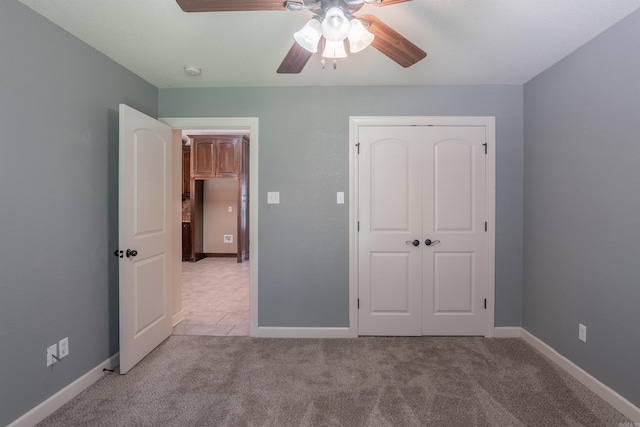 24 Tradewinds Dr, Cabot, AR 72023 - unfurnished bedroom featuring a closet, light carpet, and ceiling fan