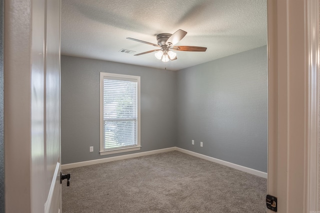 24 Tradewinds Dr, Cabot, AR 72023 - spare room with ceiling fan, a textured ceiling, and carpet