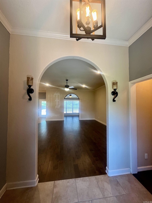 24 Tradewinds Dr, Cabot, AR 72023 - hall with arched walkways, wood finished floors, and crown molding