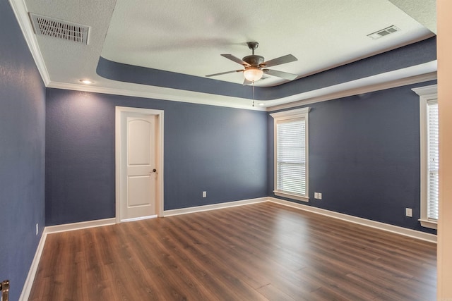 24 Tradewinds Dr, Cabot, AR 72023 - unfurnished room with a tray ceiling, ceiling fan, wood finished floors, a textured ceiling, and crown molding