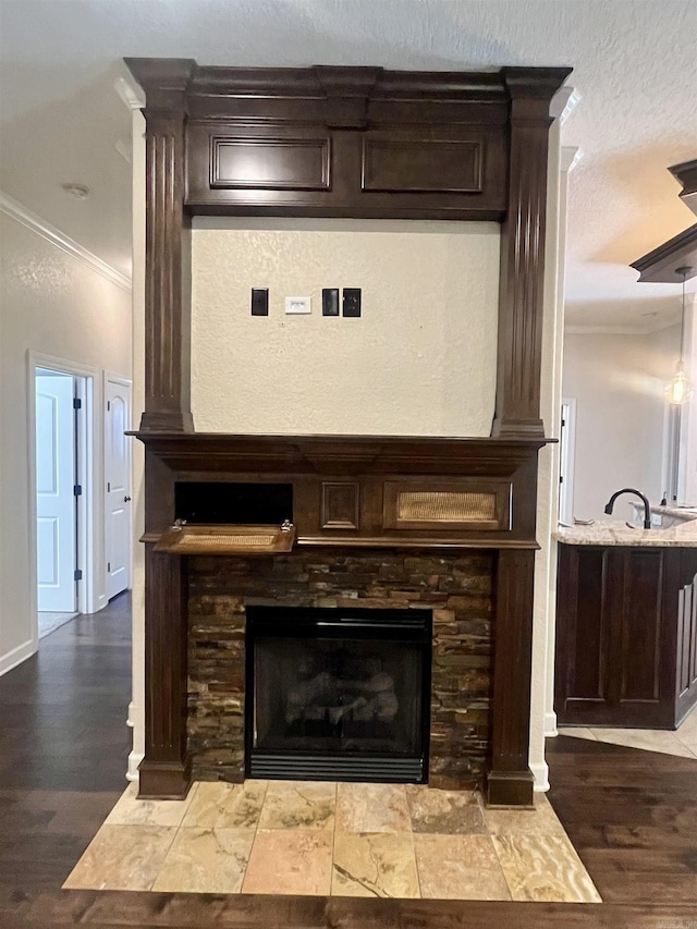 24 Tradewinds Dr, Cabot, AR 72023 - detailed view of ornamental molding, wood finished floors, and a fireplace