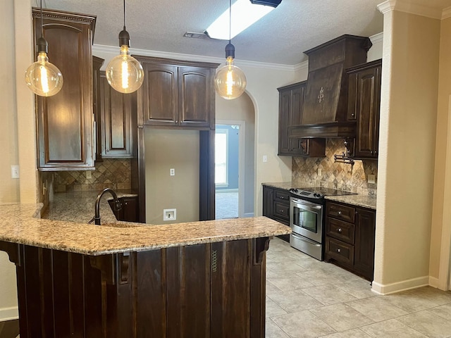 24 Tradewinds Dr, Cabot, AR 72023 - kitchen featuring stainless steel range with electric cooktop, a peninsula, dark brown cabinetry, light stone counters, and ornamental molding