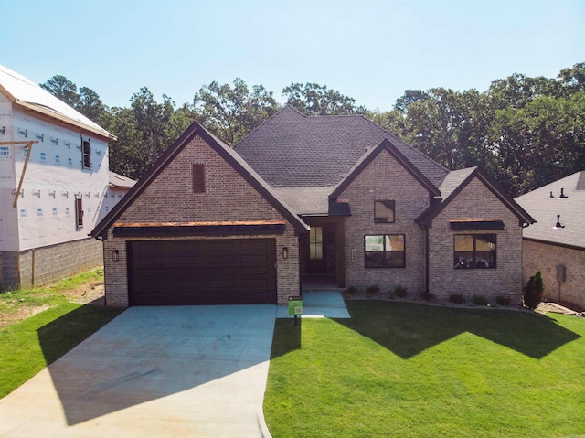 15112 Matterhorn Loop, Maumelle, AR 72113 - view of front of property with brick siding, a garage, driveway, and a front lawn
